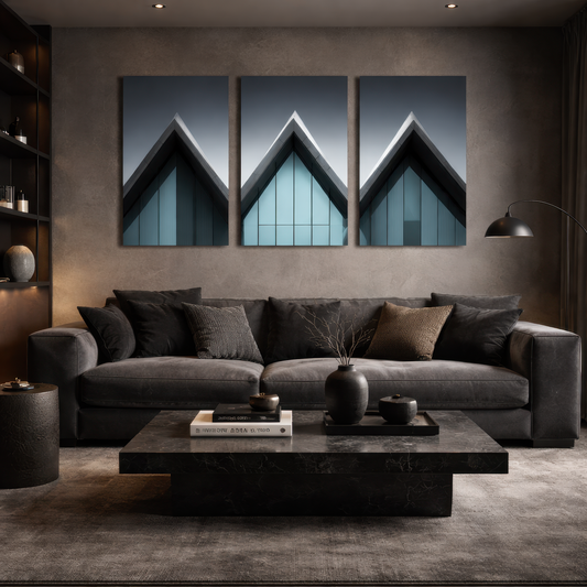 Three panel modern glass architecture artwork installed above dark sofa in elegant contemporary living room interior with moody lighting
