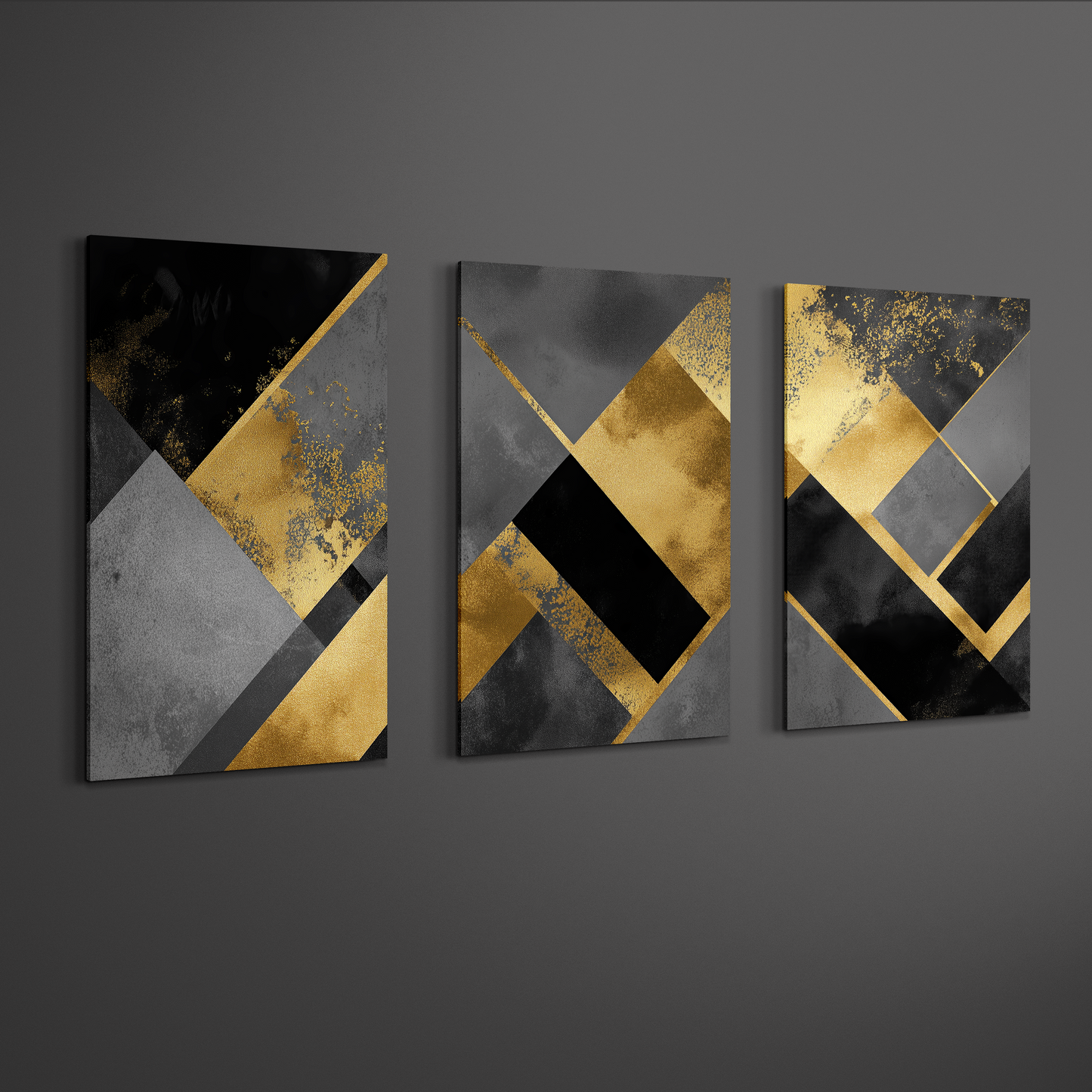 Abstract black, grey and gold geometric triptych wall art displayed on neutral wall — contemporary canvas décor.