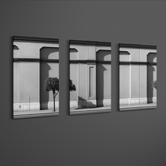 Angled side view of three panel monochrome facade wall art printed on smooth non brushed aluminum with slim 3mm profile and floating mount effect