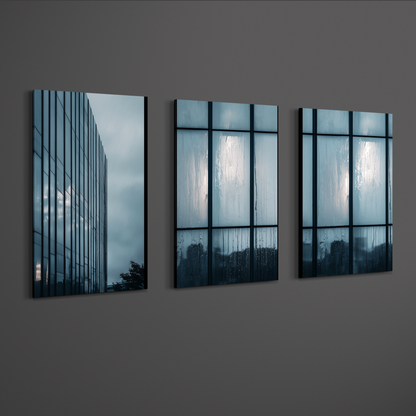 Wide perspective of blue architectural triptych wall art installed on dark wall, minimalist glass building photography for upscale interiors