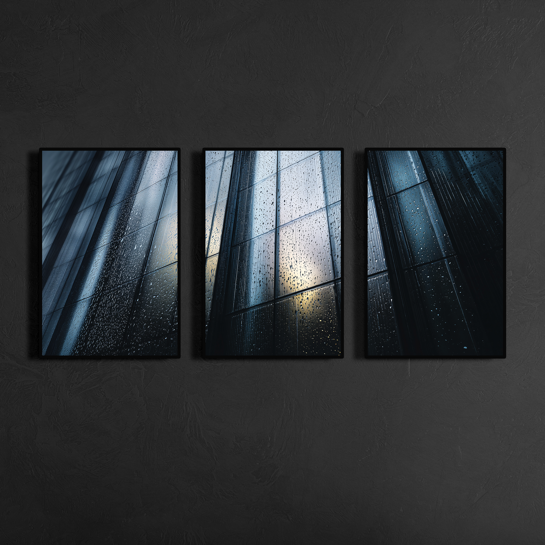 Three panel skyscraper photography wall art with slim black metal frames mounted on charcoal textured wall, moody urban decor for sophisticated interiors