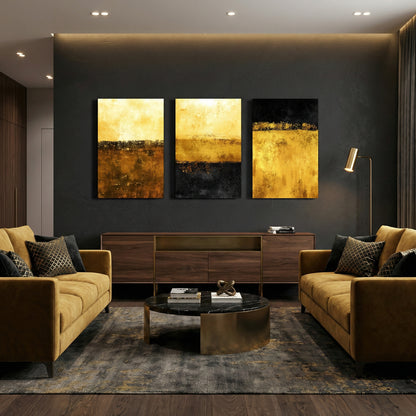 Gold and black abstract vertical triptych wall art displayed above console in modern living room — contemporary canvas décor.