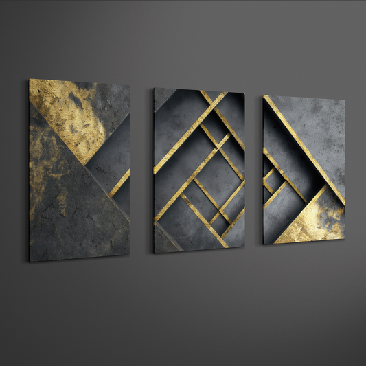 Angled view of gold and black geometric abstract triptych canvas art on neutral wall — contemporary modern décor.