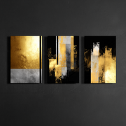 Front view of luxury gold and black abstract canvas art set displayed on wall, modern home decor.