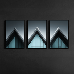 Three panel modern architectural apex building wall art poster with deep blue glass facade mounted on dark textured wall with slim black metal frames