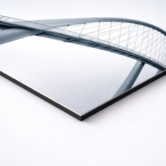 Close-up angled view of non brushed aluminum wall art showing minimalist bridge curve, sharp corners and slim 3mm profile with smooth matte surface